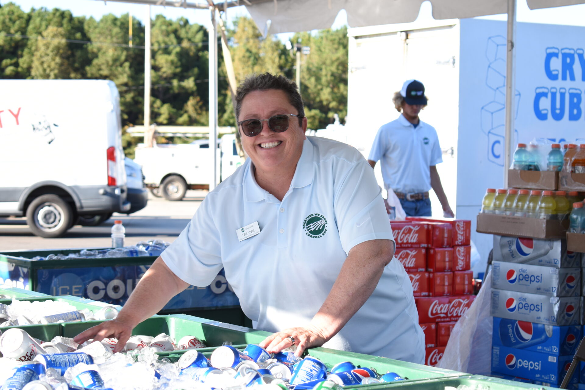 Employee serving refreshments at the Annual Meeting.